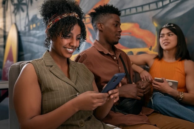 A group of young Nigerians streaming music via their smartphones, with the album art of a popular international series soundtrack visible on one of the screens.