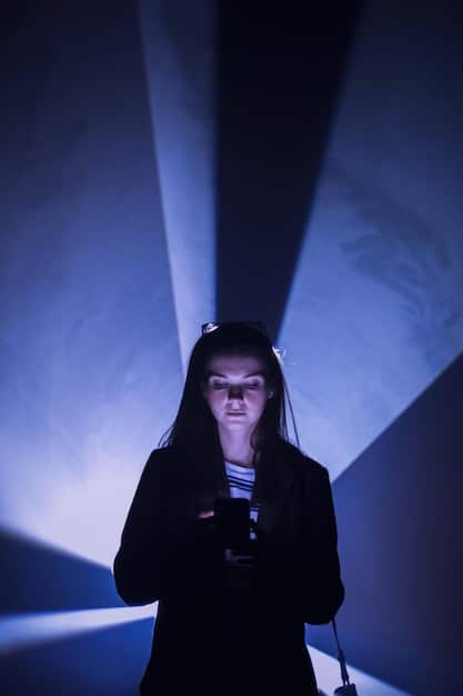 A medium shot of Stan Nze on set, deeply engrossed in a dramatic scene. The lighting highlights his intense expression.