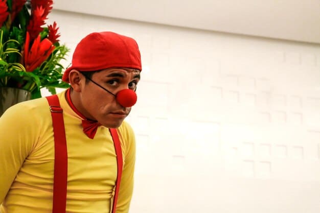 A scene from a Nigerian comedy show, with actors in exaggerated costumes and makeup, delivering humorous lines to a laughing audience. The image captures the lively and entertaining nature of Nigerian comedy.